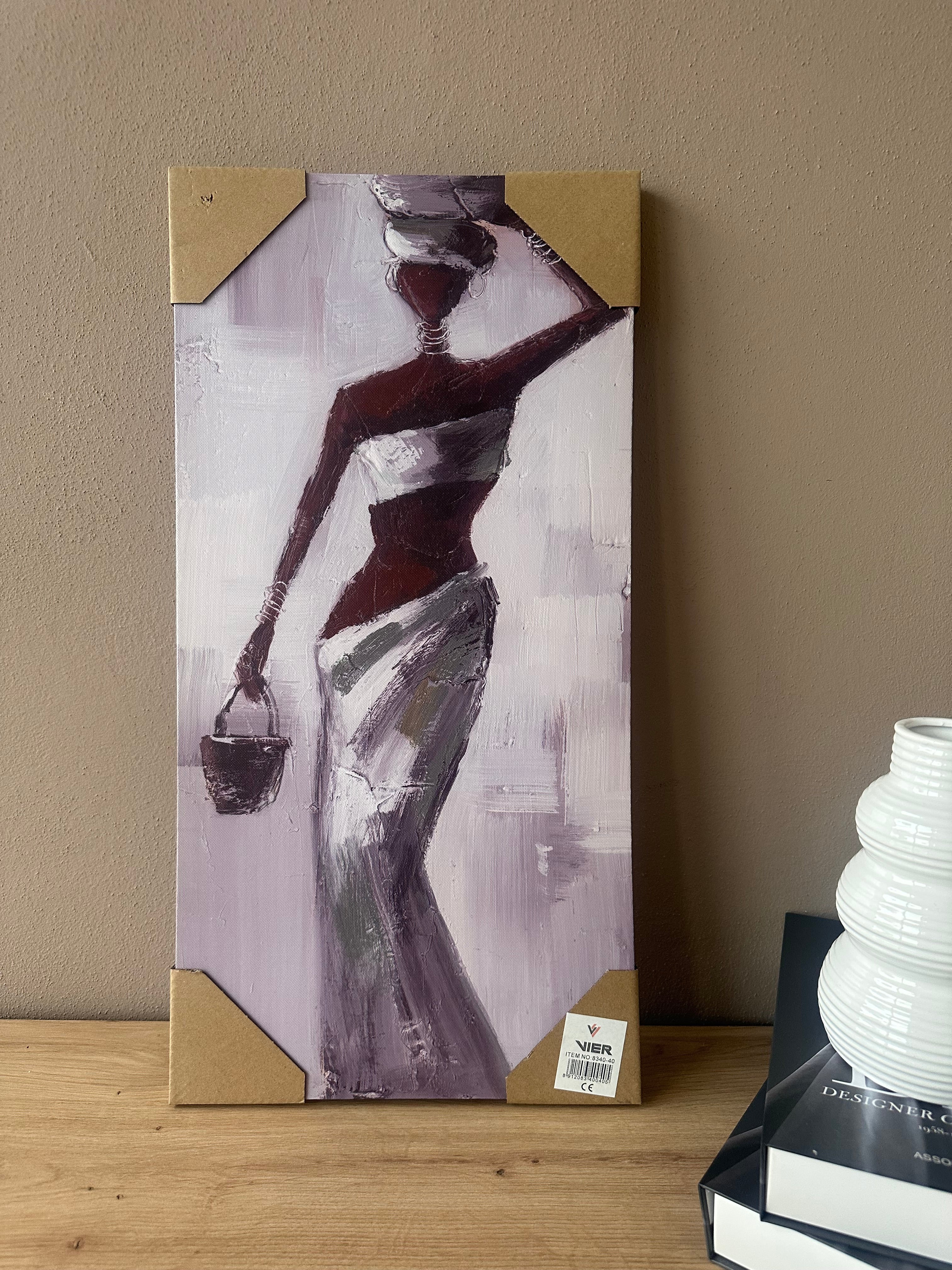 Kanavasë me figurë gruaje