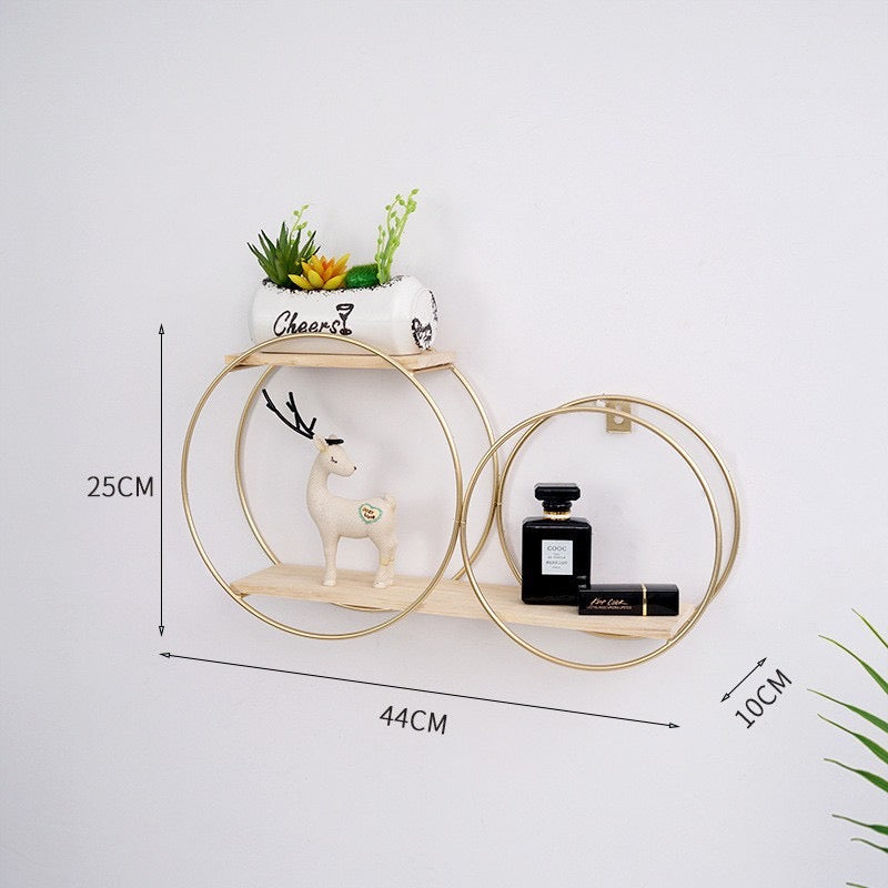 Raft metalik + dru me varje në murë, në formë 2 rrathësh madhësi të ndryshme