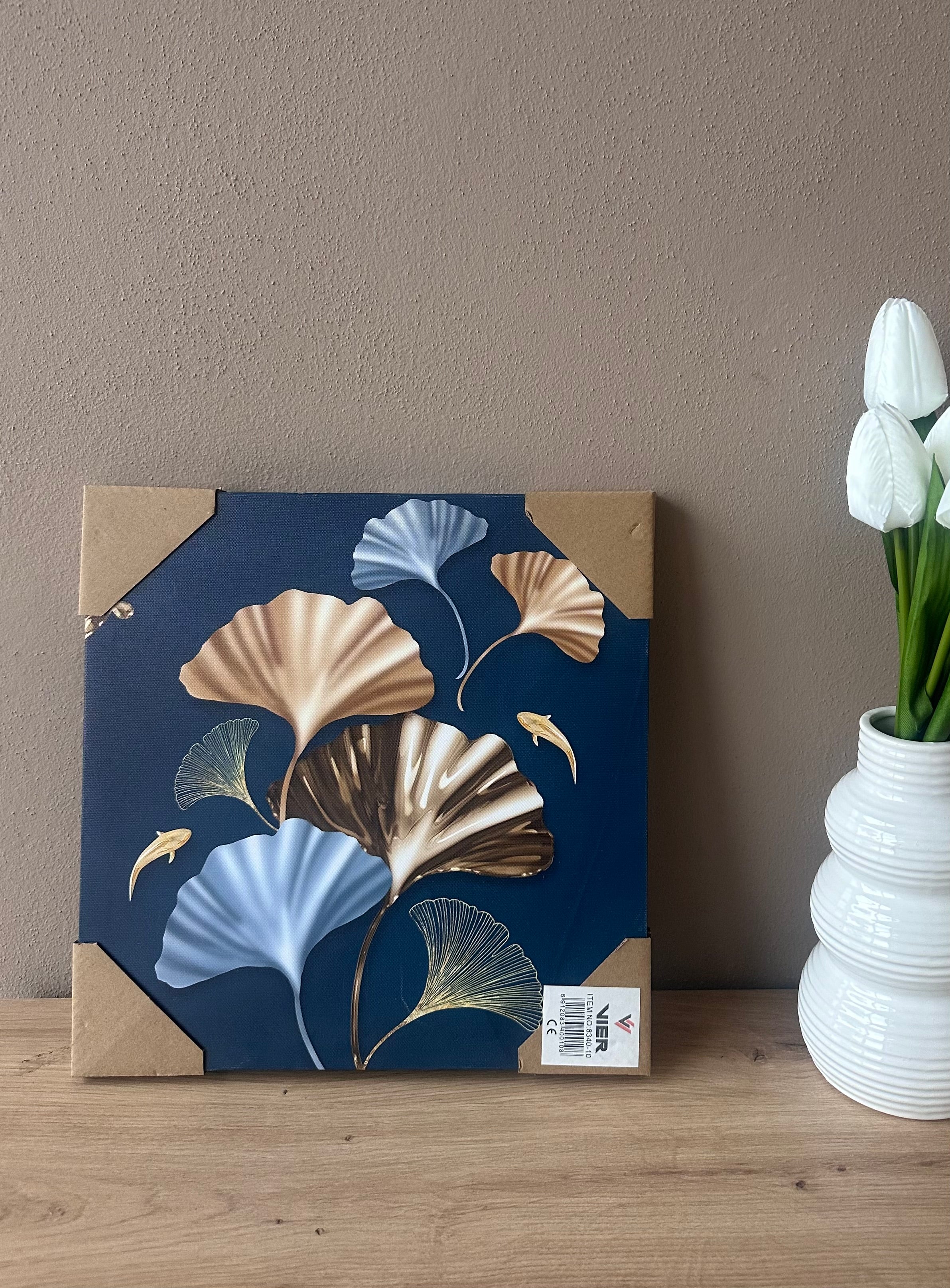 Kanavasë blu me lule gold dhe blu