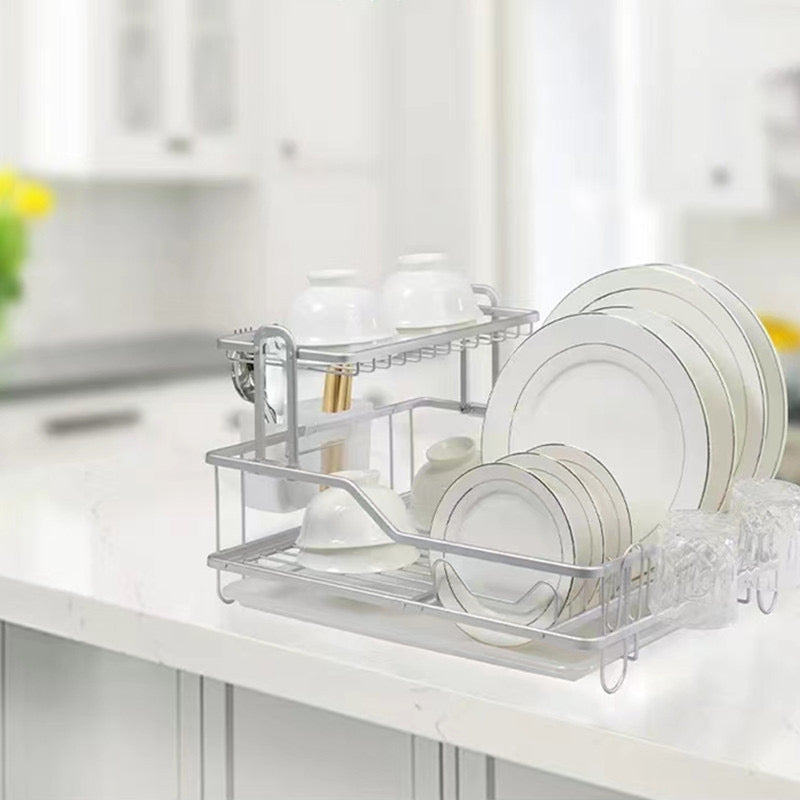 Mbajtëse metalike për pjata dhe gota