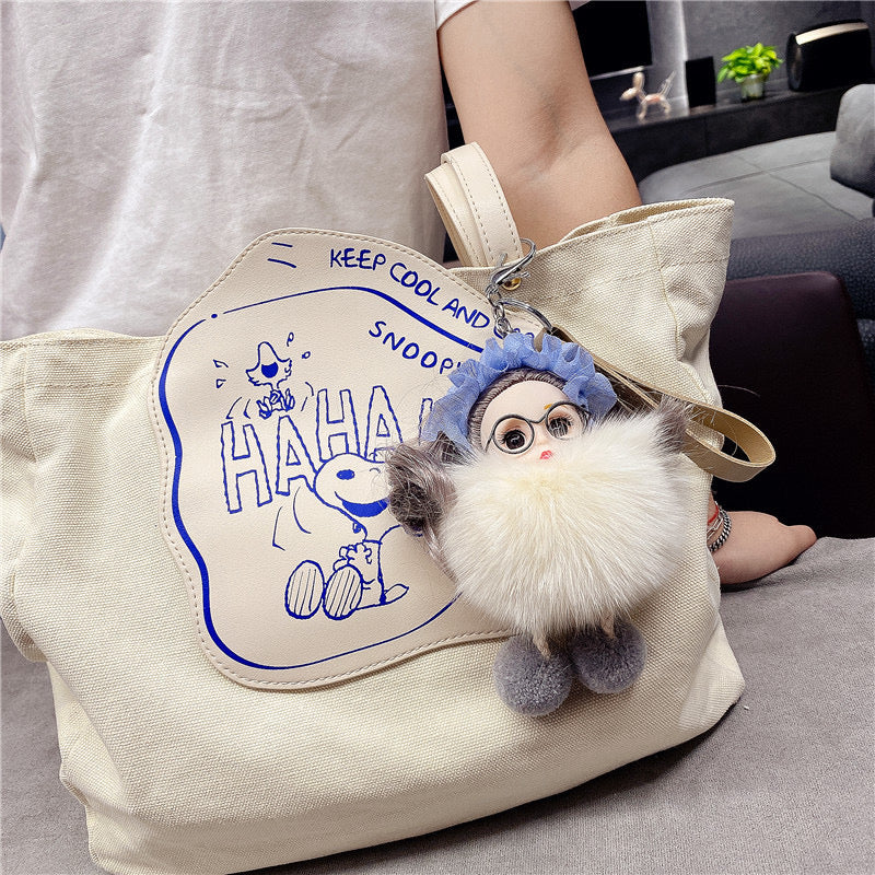 Varëse çelësash me vajzë me syze