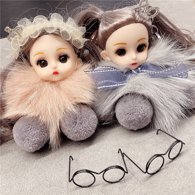 Varëse çelësash me vajzë me syze