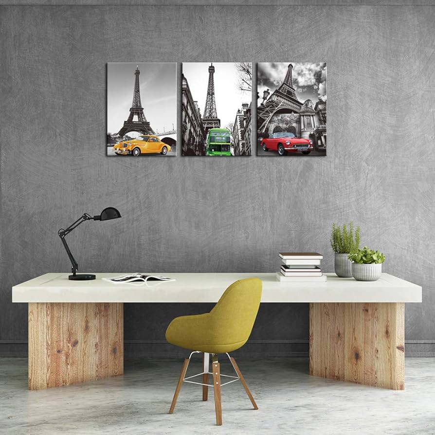 Kanavasë me kullen Eiffel dhe makinë të verdhë