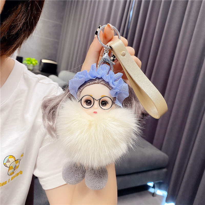 Varëse çelësash me vajzë me syze