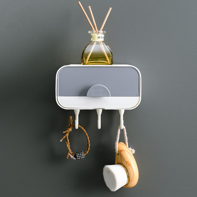 Mbajtëse multifunksionale plastike për sende të vogla