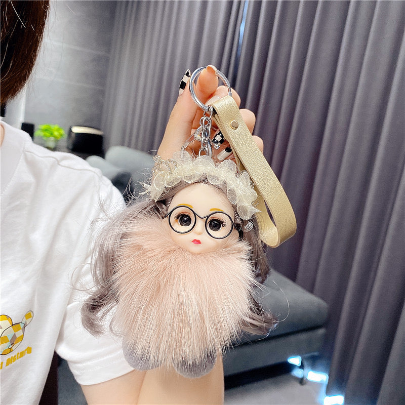 Varëse çelësash me vajzë me syze