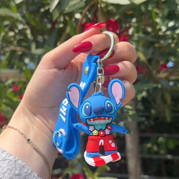 Varëse çelsash silikoni me Stitch me kitare, serfi, mottor, kufje etjl