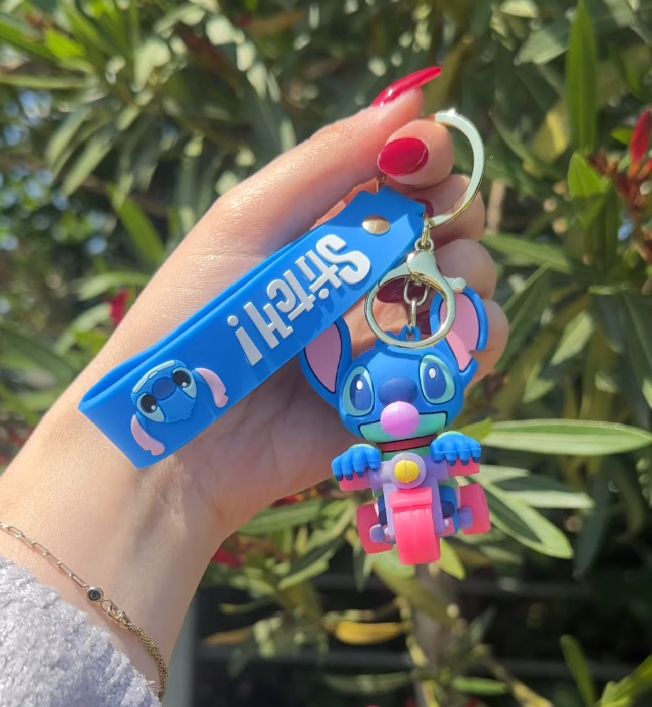 Varëse çelsash silikoni me Stitch me kitare, serfi, mottor, kufje etjl