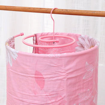 Varëse rrobash në formë spirale