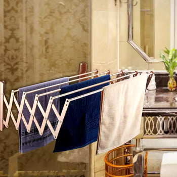 Nderëse rrobash me ngjitje në murë