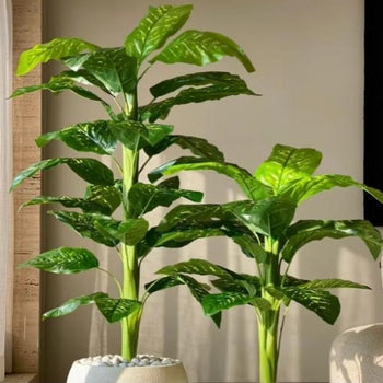 Degë dekorative artificiale me gjethe të gjera jeshile