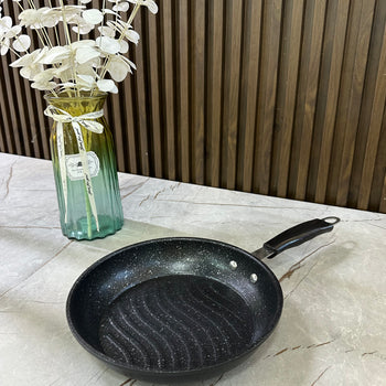 Tigan kuzhine anti-ngjitës me bazë të valëzuar