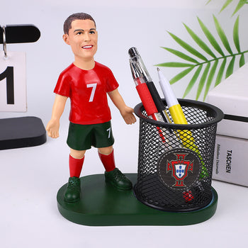 Mbajtëse stilolapsash me futbollist