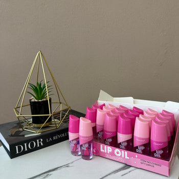 Lip oil me shkëlqim në disa nuanca