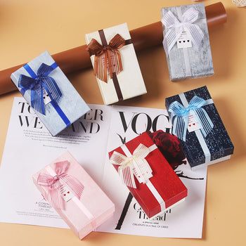 Set me 3 kuti paketimi dhuratash me fjongo transparente me vija