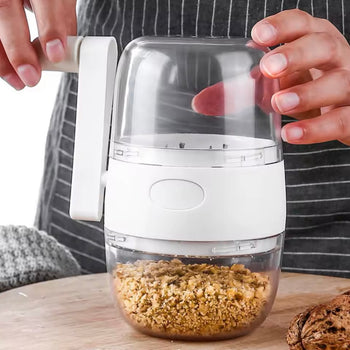 Makineri manuale për thyerjen e arrave dhe frutave të thata