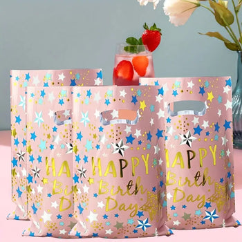 Qese për ditëlindje në ngjyrën e bardhë, e zezë, rozë me shrim “Happy birthday” dhe yje