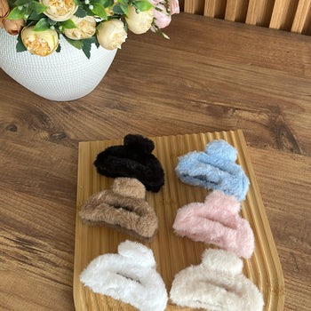 Kapëse flokësh e harkuar