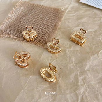 Kapëse flokësh e vogël metalike, gold