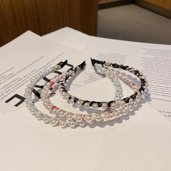 Rreth flokësh me perla të mëdha