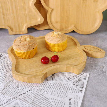 Pjatë druri në formë molle të kafshuar