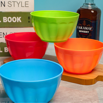 Tas plastik i rrumbullakët për të mbajtur perimet