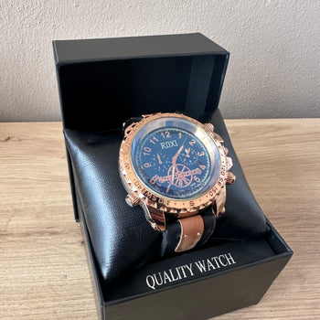 Orë për meshkuj rose gold me rrip të zi imitim lëkure e detaje kafe