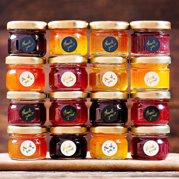 Stiker për paketime dhuratash me  ngjyra të ndryshme e shkrim “thank you”