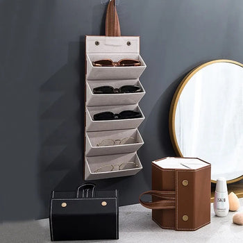 Organizuese portable për syzet