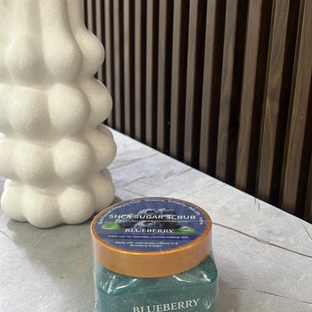 Scrub me boronicë  “Shea Sugar Scrub”