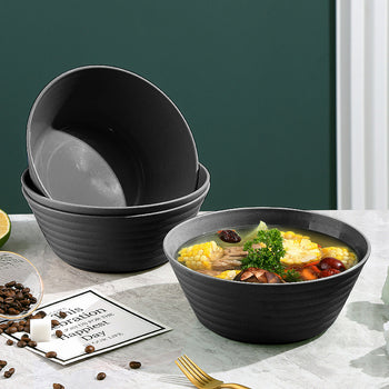 Tas melamine e zezë me formë rrathësh nga ana e jashtme