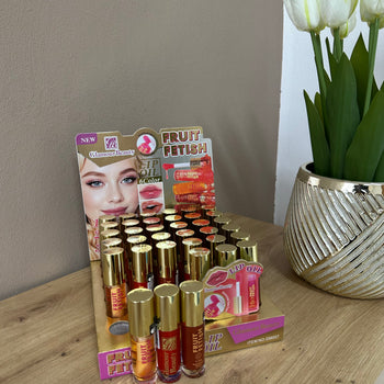 Lip oil për buzë me aromë frutash