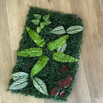 Panel dekorativ me gjelbërim artificial