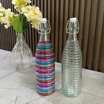 Shishe qelqi dekorative me dizajn spiral për vaj dhe pije