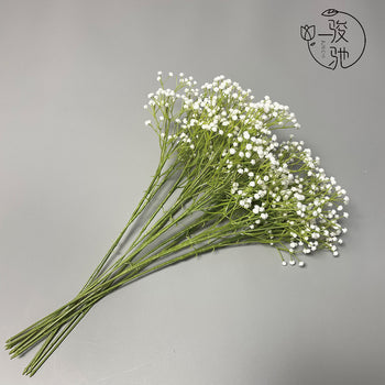 Tufë e vogël me lule artificiale fushe