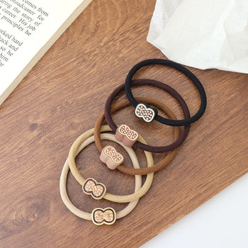 Set me 2 lidhëse flokësh me gur në formë fjongoje