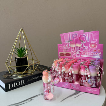 Lip oil me dizajn me varëse, hidraton dhe jep shkëlqim