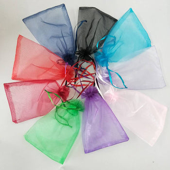 Paketim tyl për paketim dhuratash, në ngjyre pink me lidhëse 9*12 cm