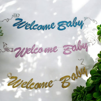Banner me xixa me shkrim '' Welcome baby''